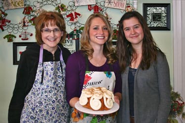 pic holding cakes