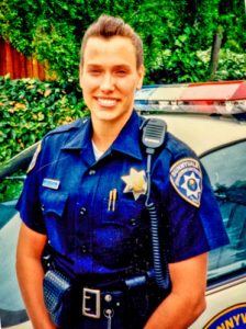 Photo of Terri Wiebold as a police officer