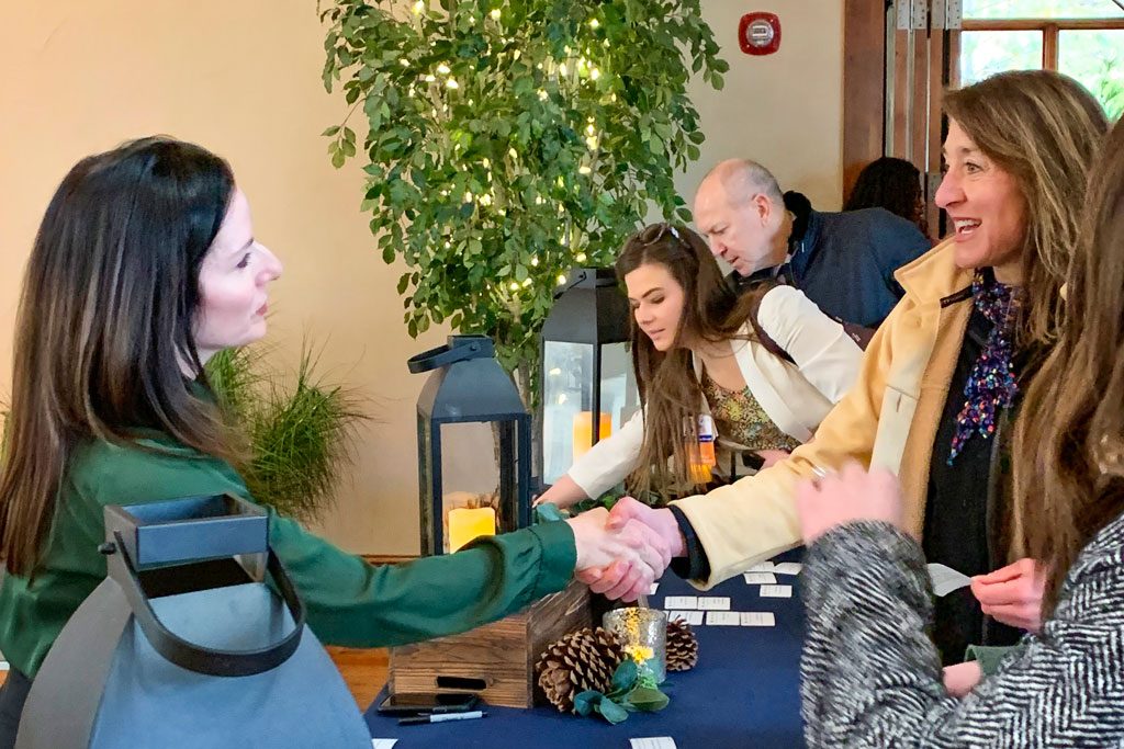 Chamber greeting guests at luncheon