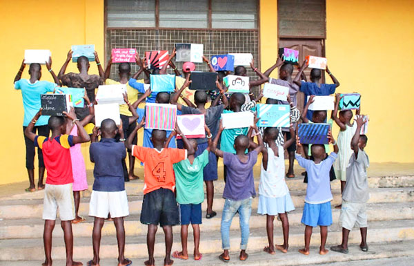 Photo of children of Ghana with their blessing boxes.