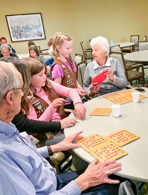 Photo Girls Scouts with Valentine themed prizes