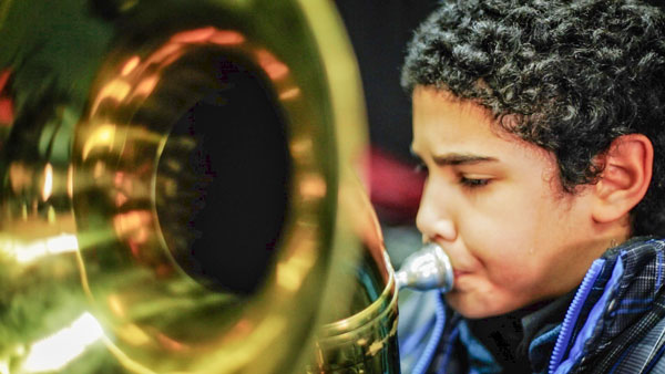 Boy playing Tuba