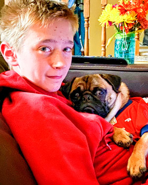 Photo of boy with dog