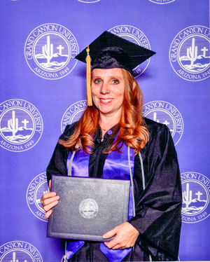 Photo of Kathy Gallegos graduating from Grand Canyon University