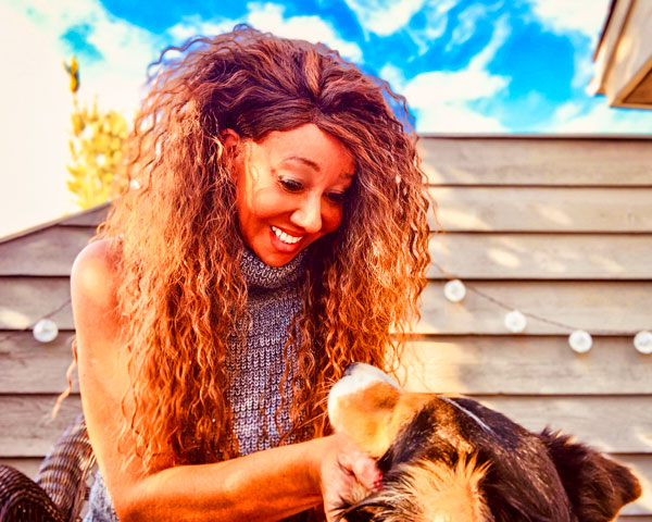 Photo of Marco Fields and her dog, Callie.