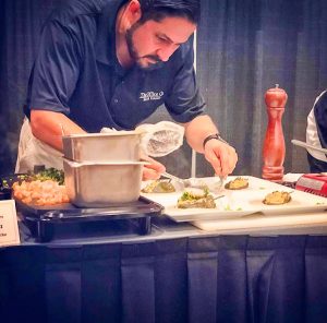 Photo of owner Mike Hernandez very hands-on at work.