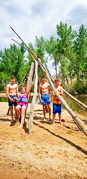 Photo of kids that paddled to sand bar at Chatfield Reservoir