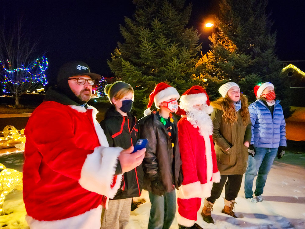 Photo of Students and family members joined the inaugural Douglas County Campus Life Christmas Caroling in the Pines