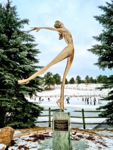 Evergreen Lake House stands the Peggy Fleming sculpture