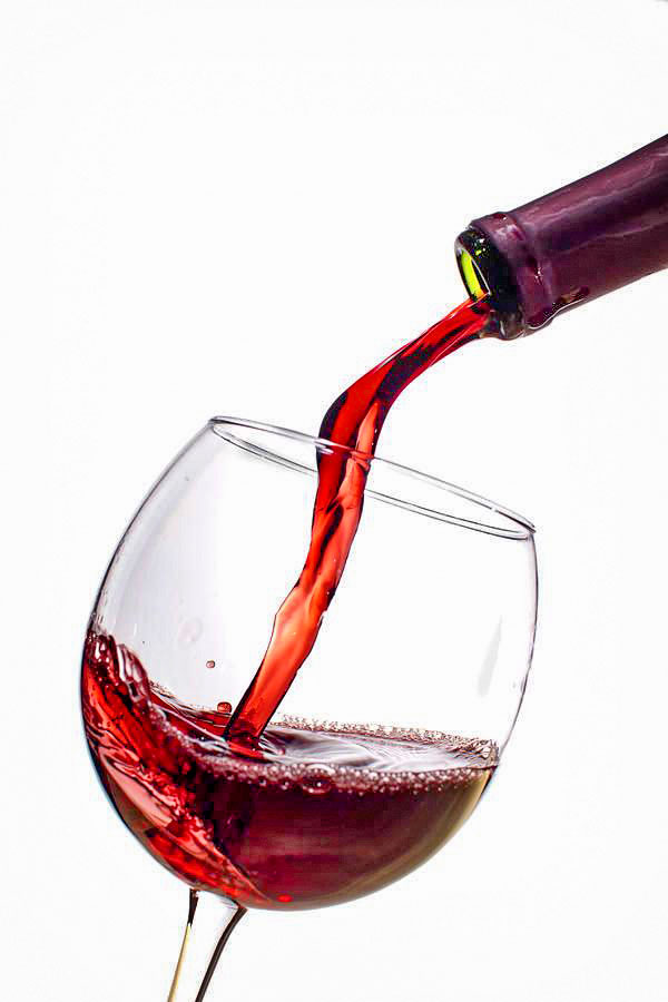 Photo of wine pouring into glass