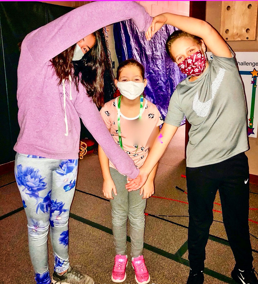 Photo offifth grade students Aurora Hussey, Diane Al Bakri and Fletcher McDonald.