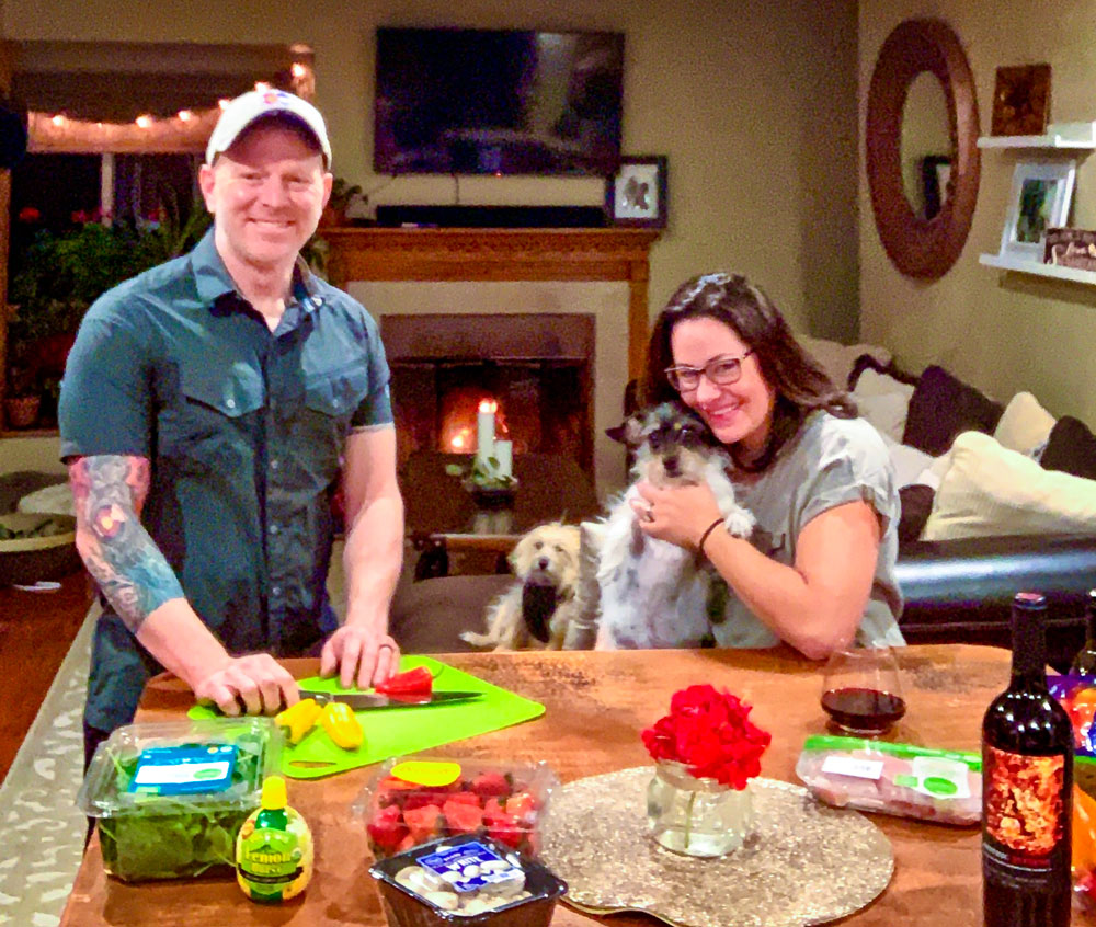 Photo of Chris Dudley and his wife Sheera prepare meals together