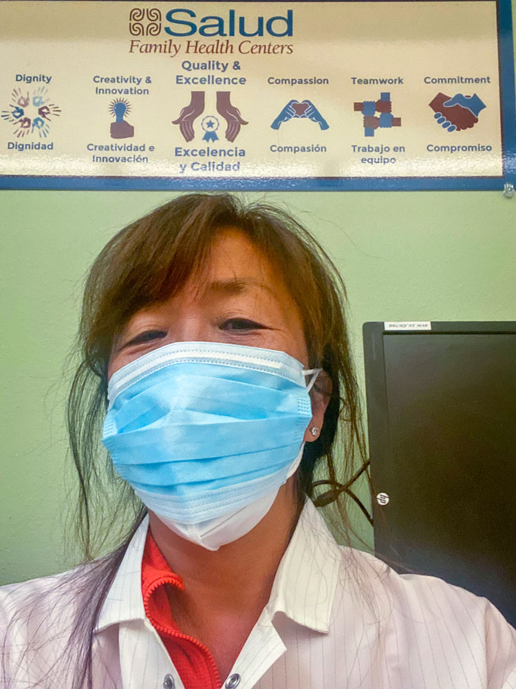 Photo of Hiemi Haines who volunteers at several vaccination clinics that serve low-income