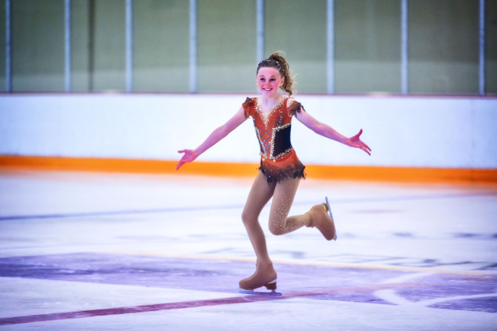 Photo of figure skater Autumn Hall skates at a regional competition