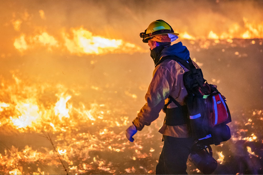 Photo of SMFR crew fighting a wildland fire