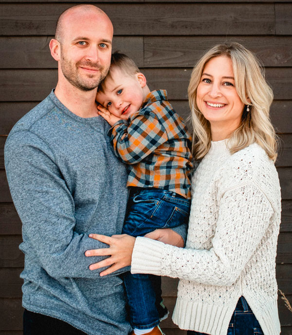 Photo of Ryan and Eryn Coufal with their son, Bodhi.