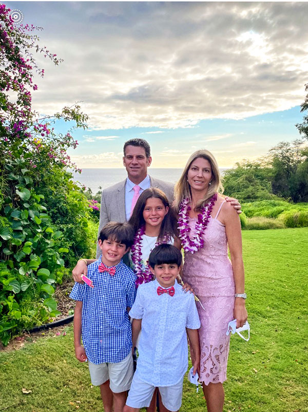 Photo of Drs. Michael and Laura Rosenberg at a wedding in Maui, Hawaii with their children Reese (11), Noah (9) and Cameron (7).
