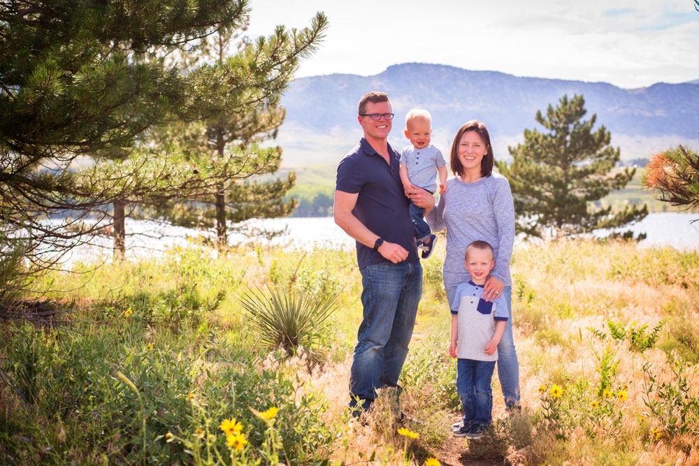 Photo of Jacey Dobbel and her husband, Matt with kids, Waden and Bauer