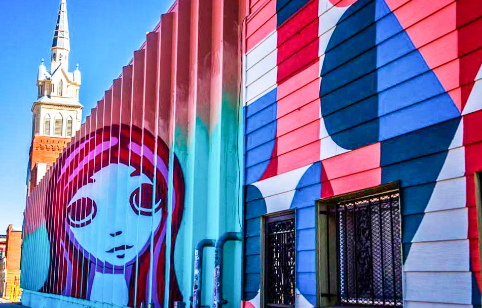 Photo of “Larimer Boy and Girl” is memorable street art.
