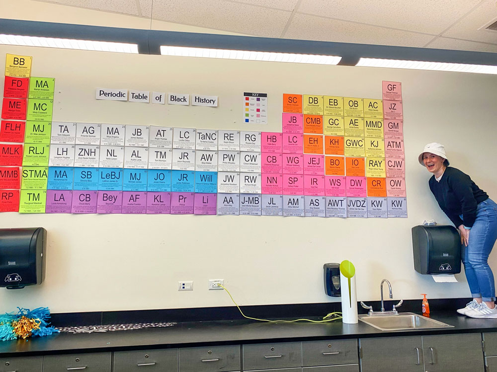 Photo of Meredith Wilemon displays her Periodic Table of Black History