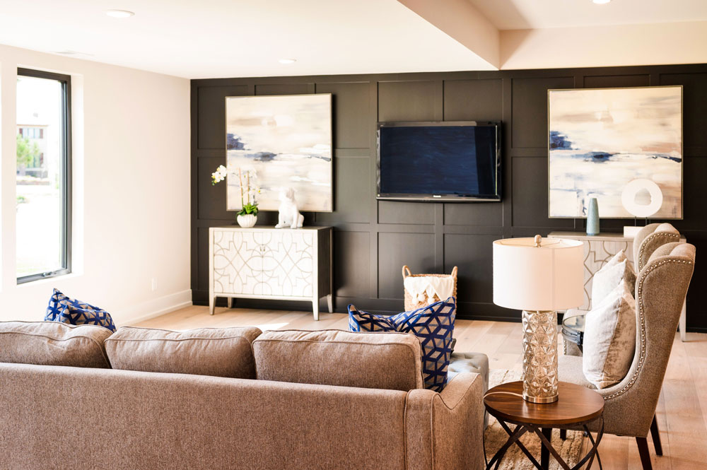 Photo of a staged home showing an on-trend accent wall with dimensional wood