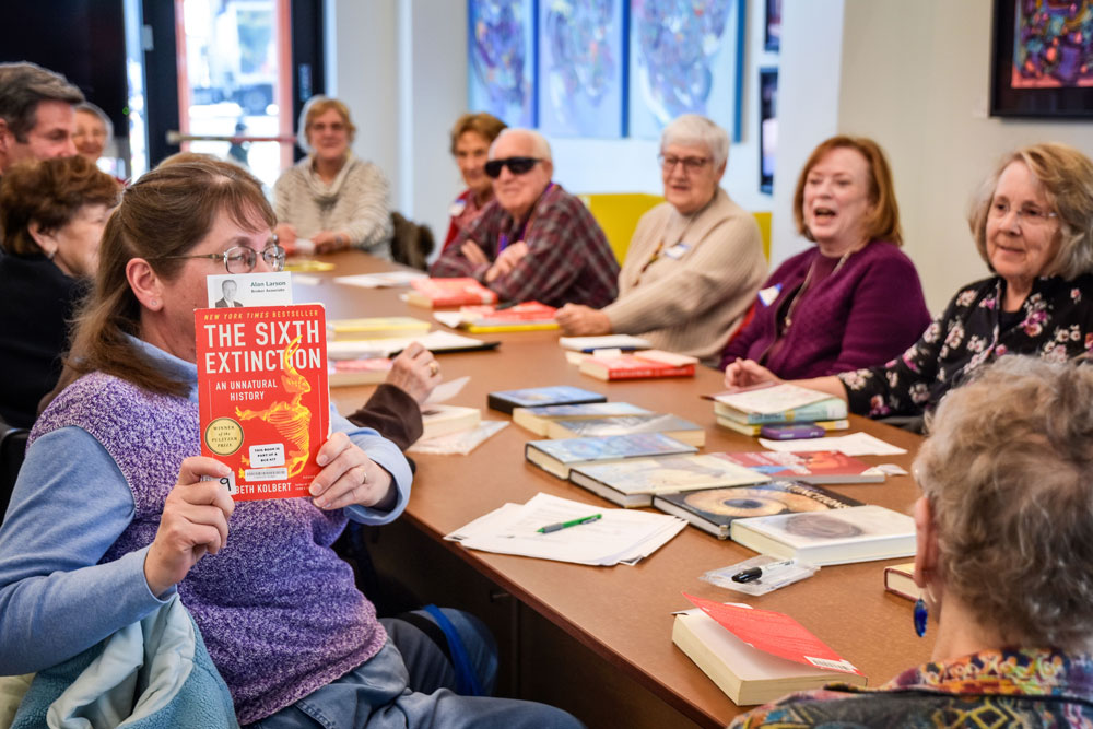 Photo of Book lovers enjoying discussion of all kinds of books