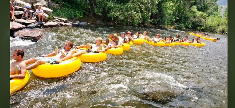 Photo of Rock Canyon High School varsity soccer team tubing at Clear Creek