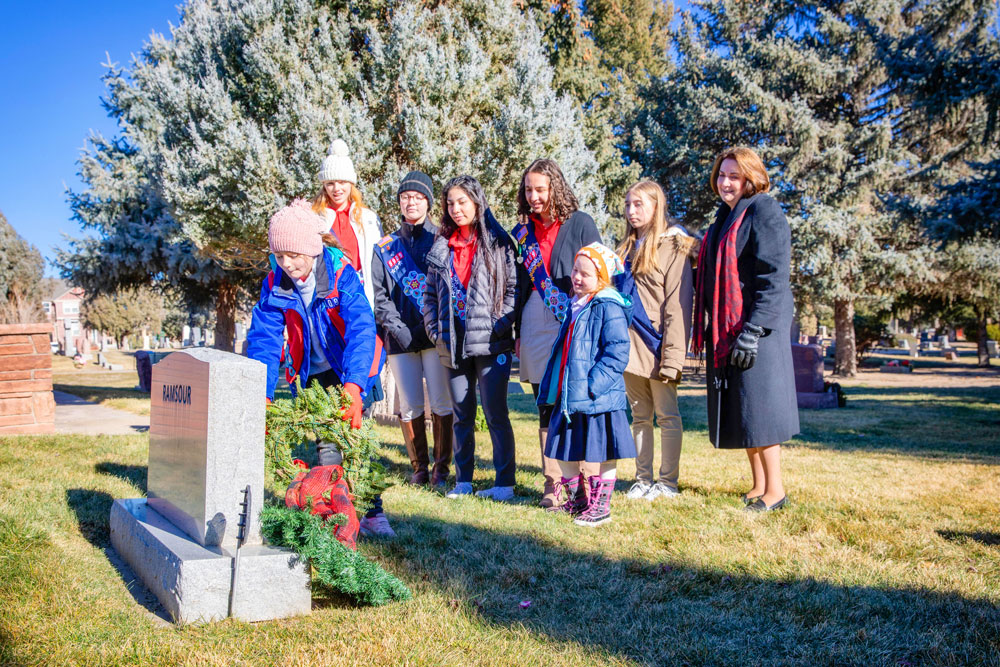 Photo of County Commissioner Lora Thomas (far right) stands with American Heritage Girls Troop 8909