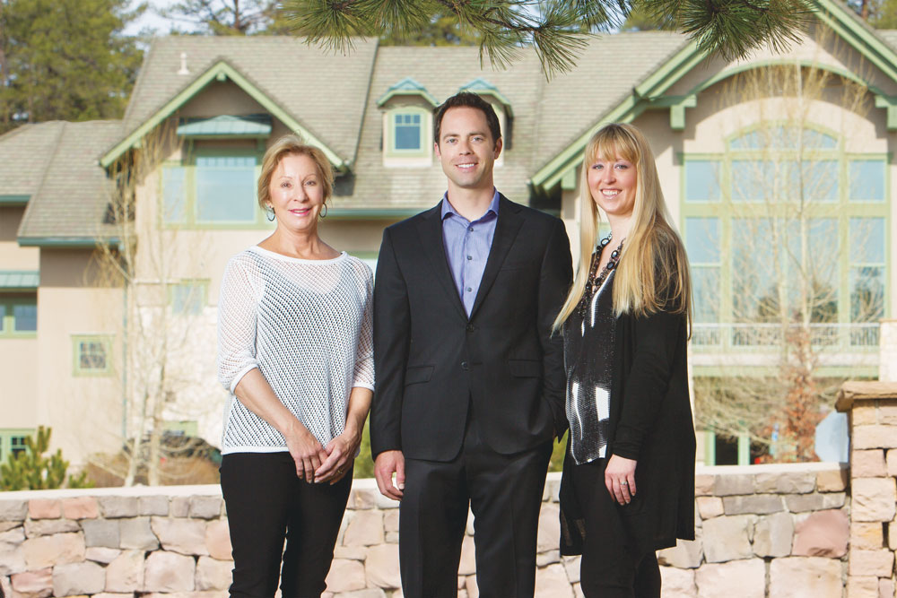 Photo of Roz Schroeder stands with her son Todd Nelson and step-daughter Stacy Harris.