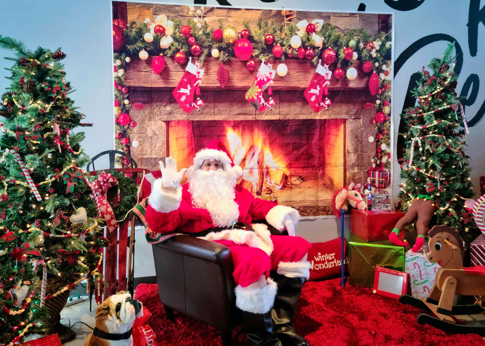 Photo of Santa making a surprise visit to the Christmas store at Journey Church