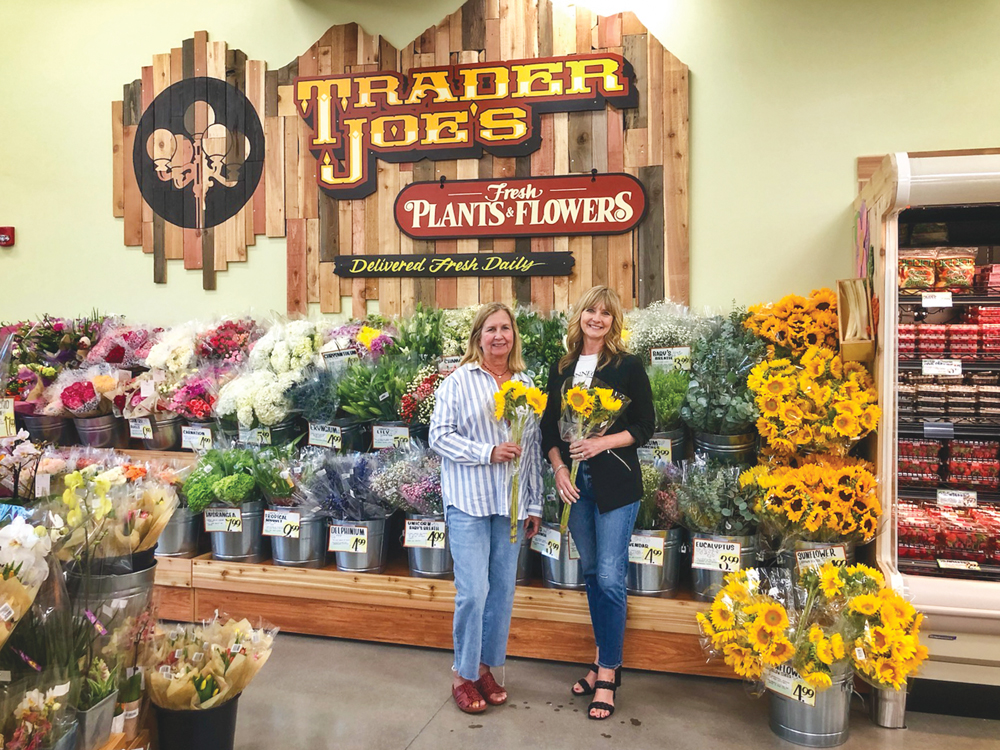 Photo of Castle Pines Connection staff members and Castle Pines residents Lynn Zahorik (left) and Julie Matuszewski (right), at new Trader Joe's in Parker