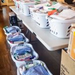 Photo of Women from The Church of Jesus Christ of Latter-day Saints with donated items.