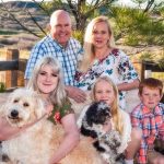 Photo of the Stotz family: Mark and Stacy, Caitlyn, Lindsey and Christian with Seymour the do.