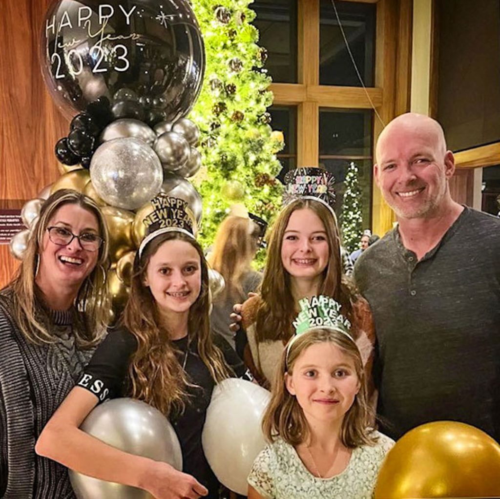 photo of family and balloons