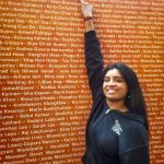 photo of talented teen pointing to her name