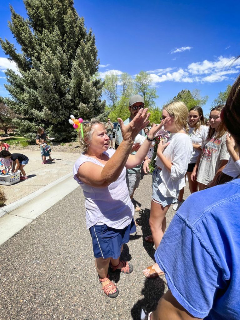 photo of teacher talking to students