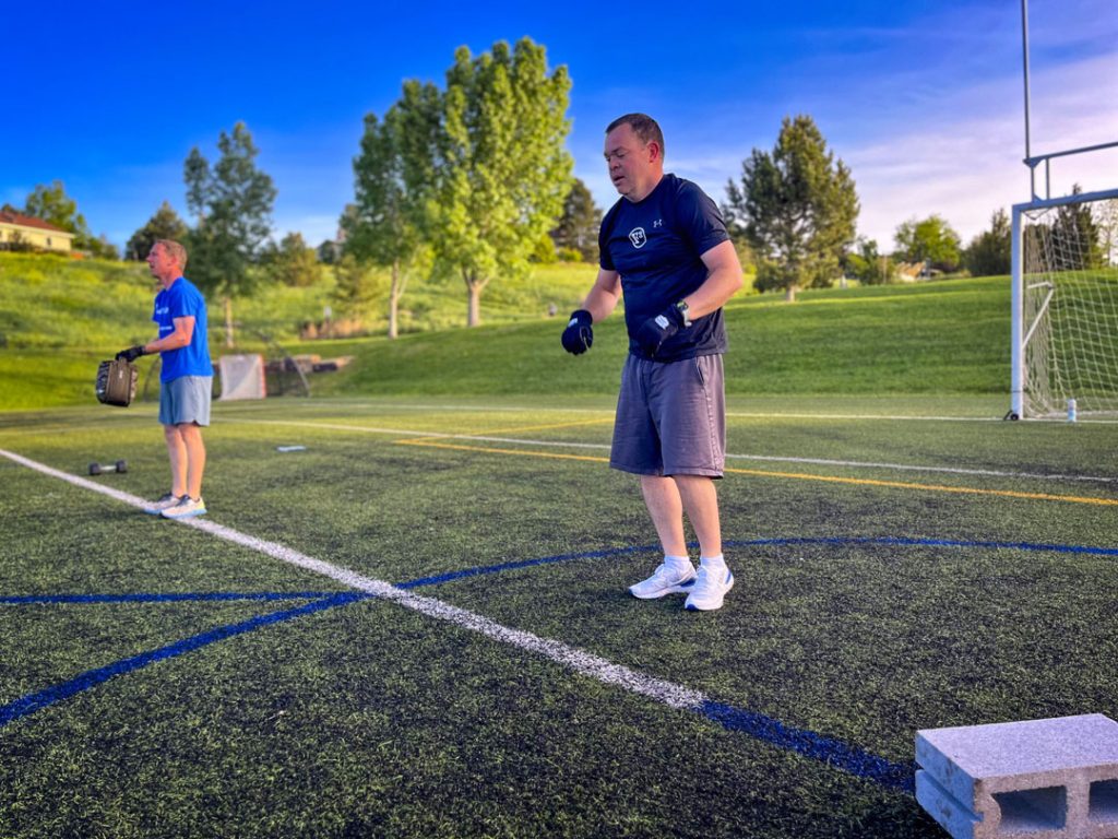 closer photo of men exercising outside