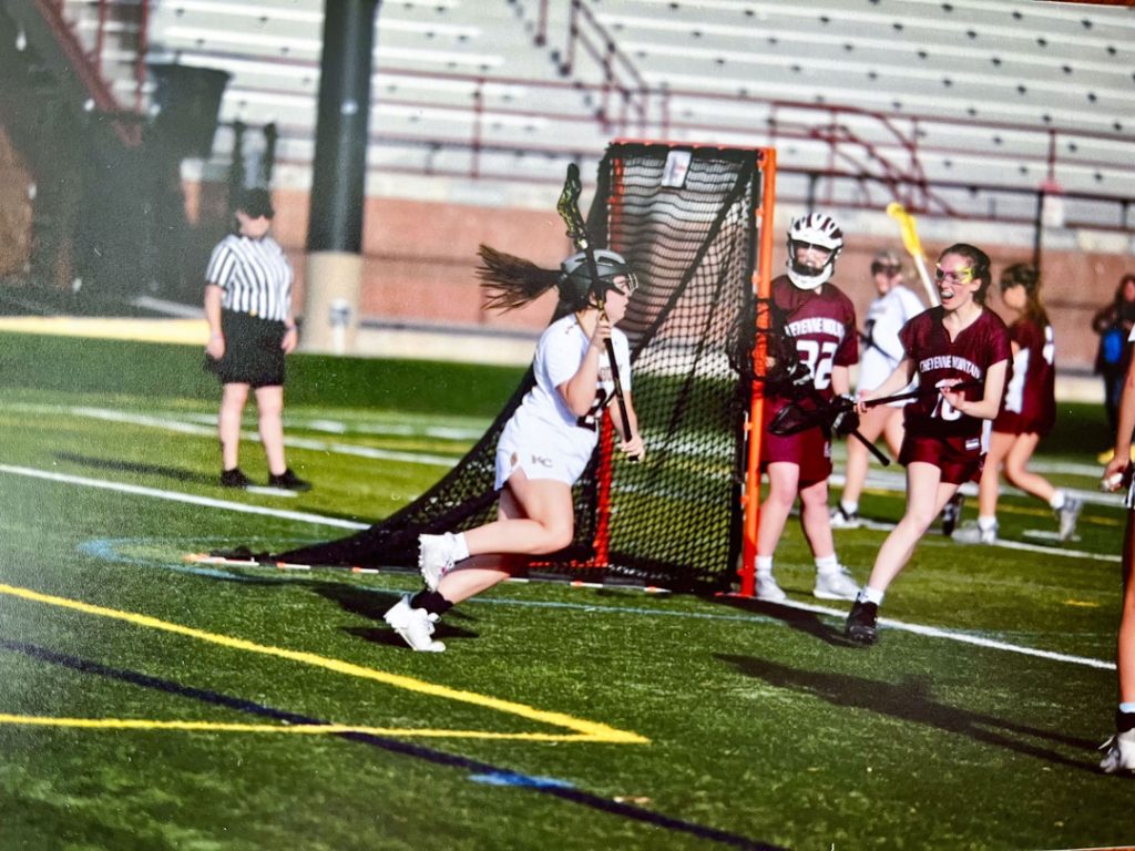 photo of student athlete playing lacrosse