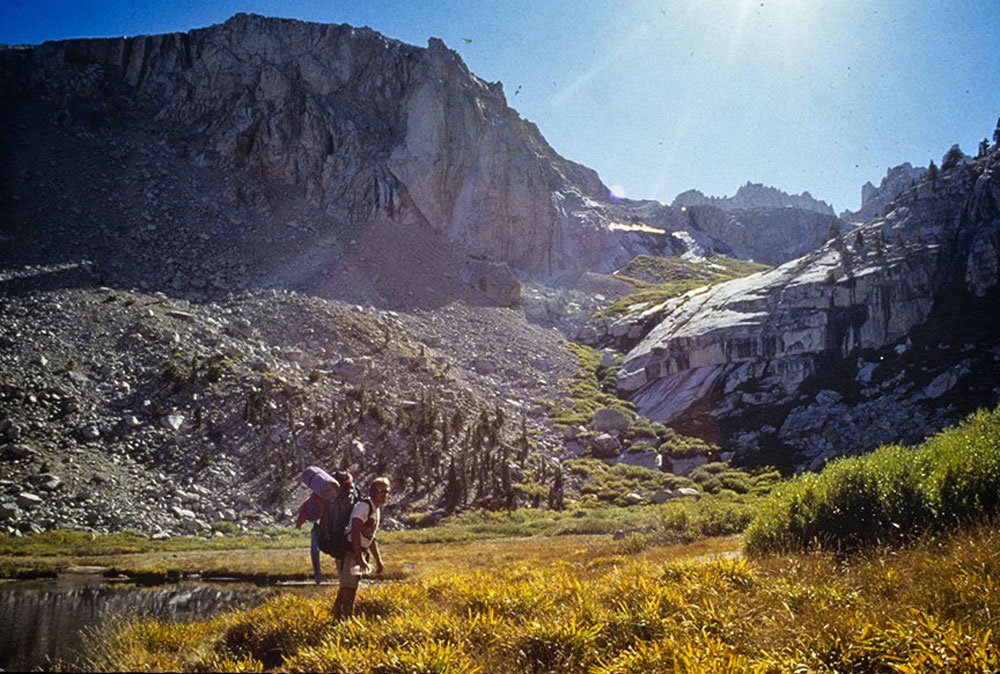 man hiking in mountains