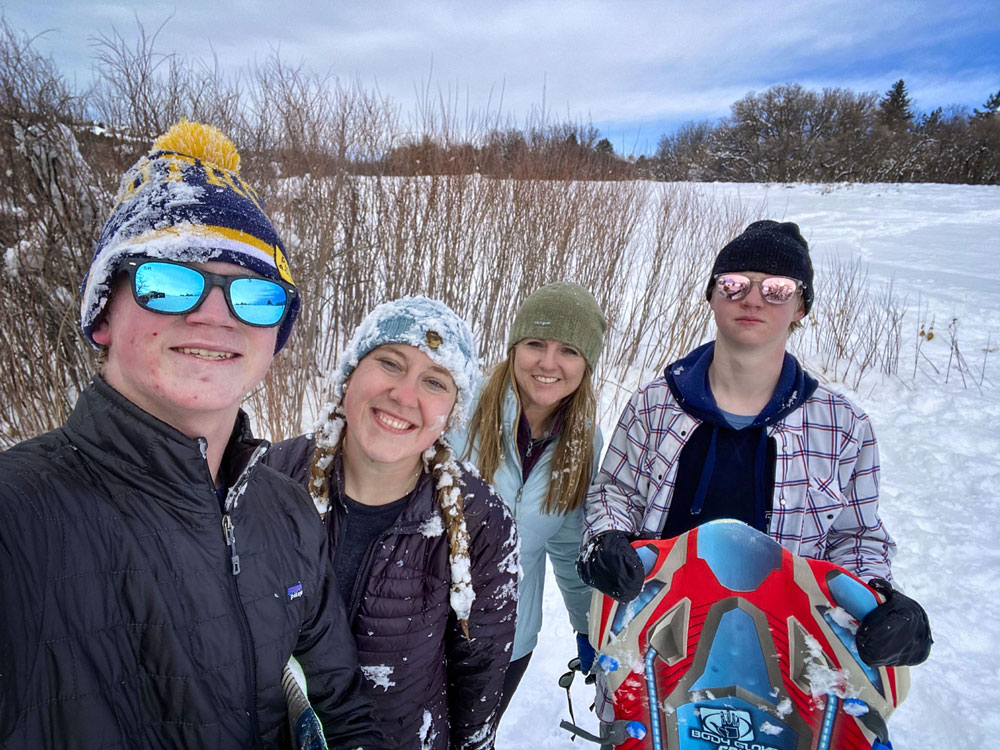 group of people outside in the winter