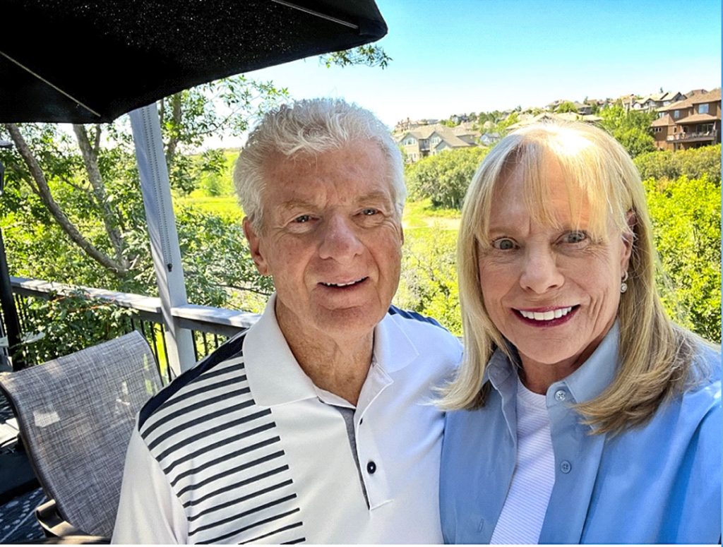 couple outside on their deck