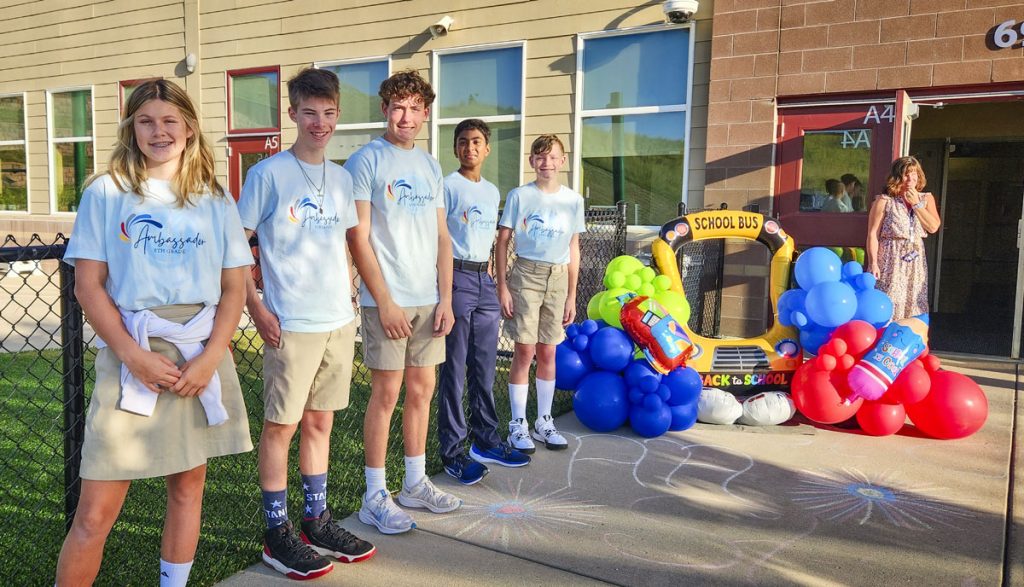 kids lined up in front of school