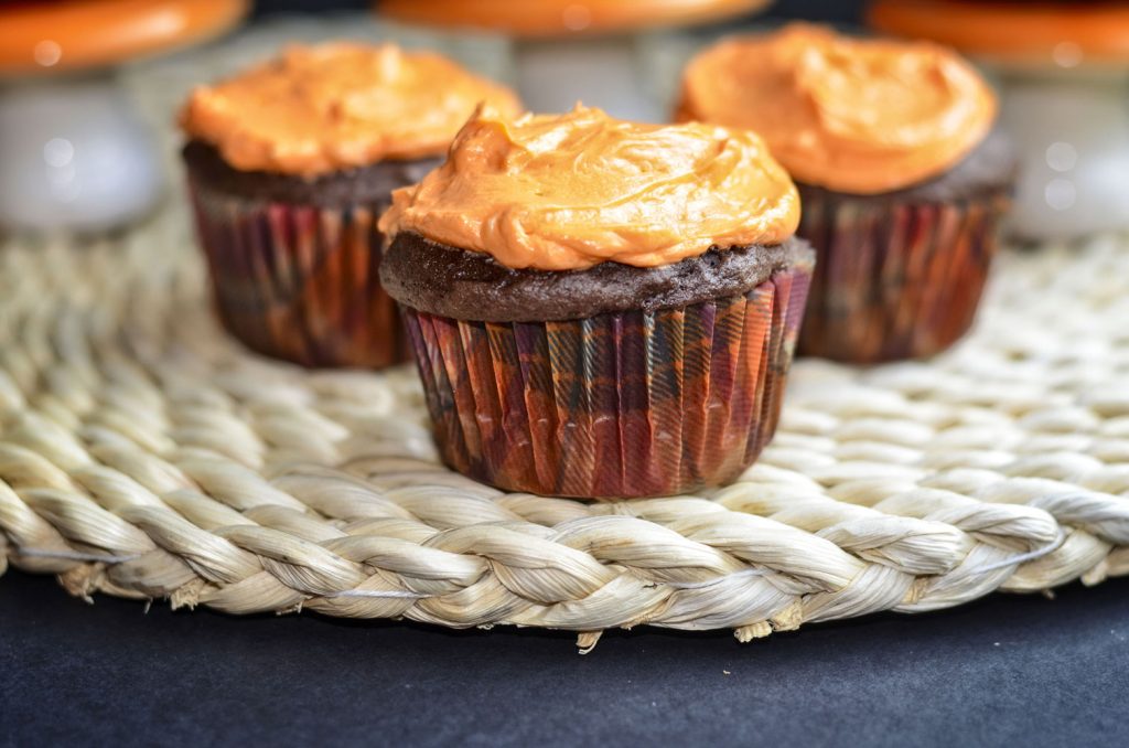 cupcakes with orange frosting