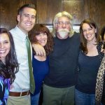 group of people in kitchen