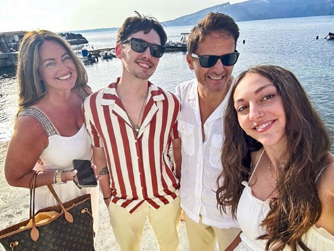 people smiling at a beach