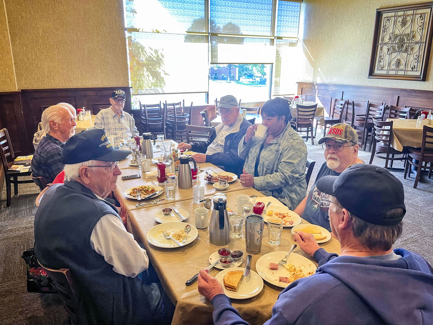 group of people eating in restaurant