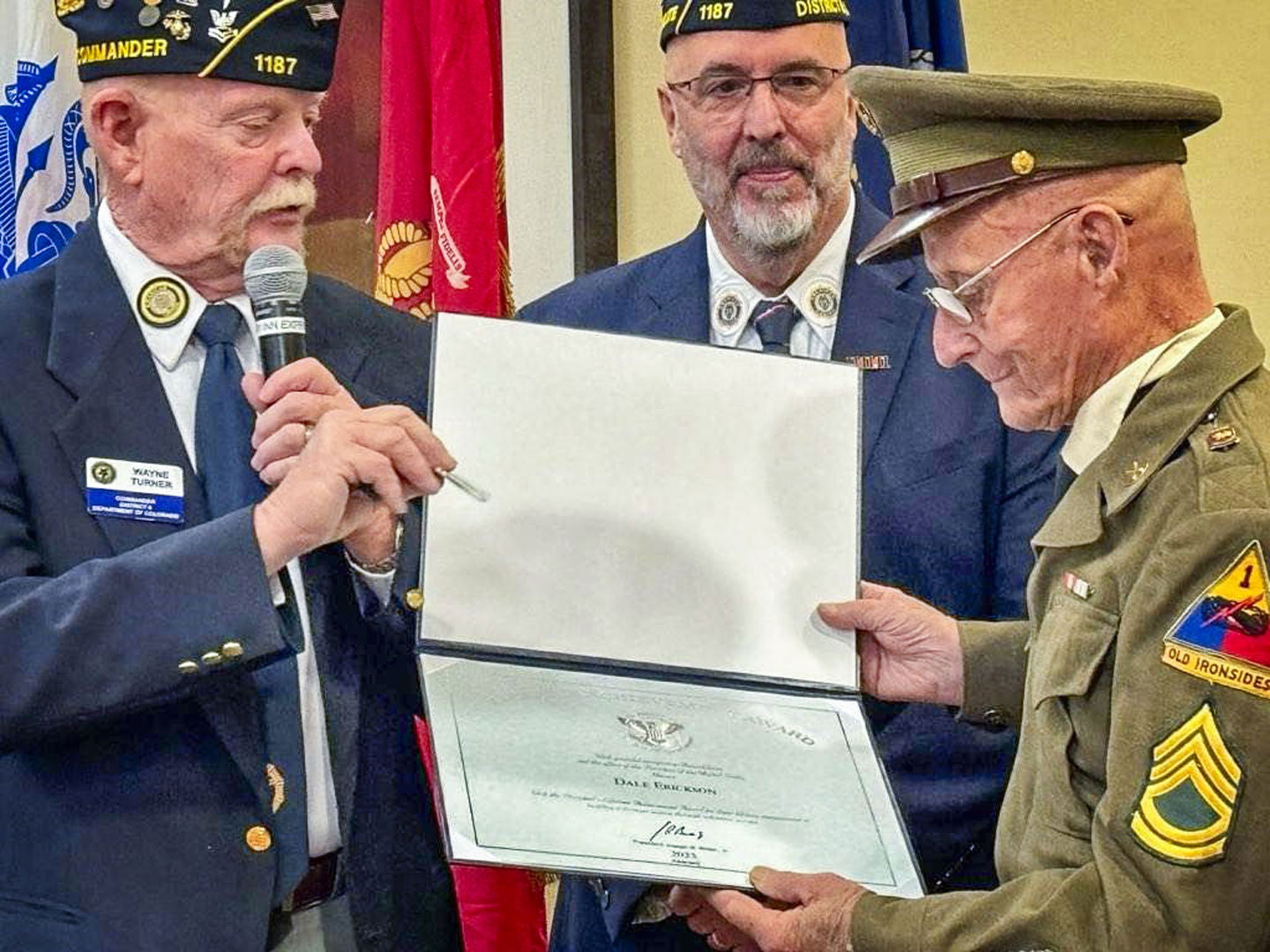 three men in uniform