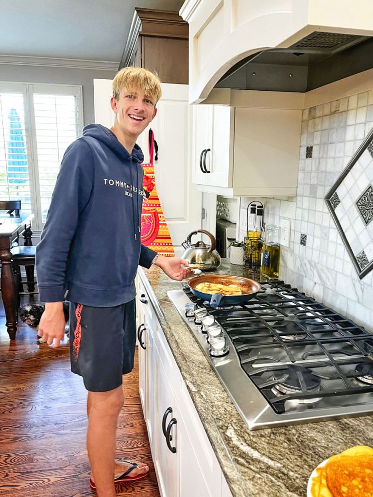 high schooler in kitchen