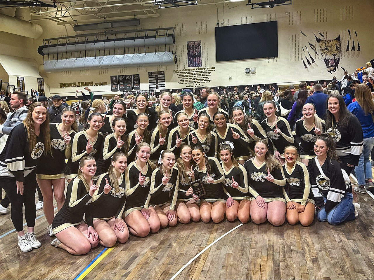 group of cheerleaders in school gym