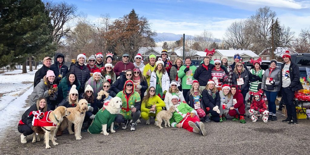 large group of people dressed in holiday clothes outside